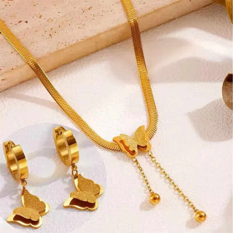 Collar mariposa + aretes Pandora